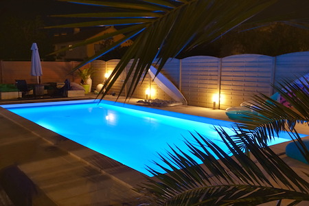 How can pool lighting enhance safety style and nighttime enjoyment